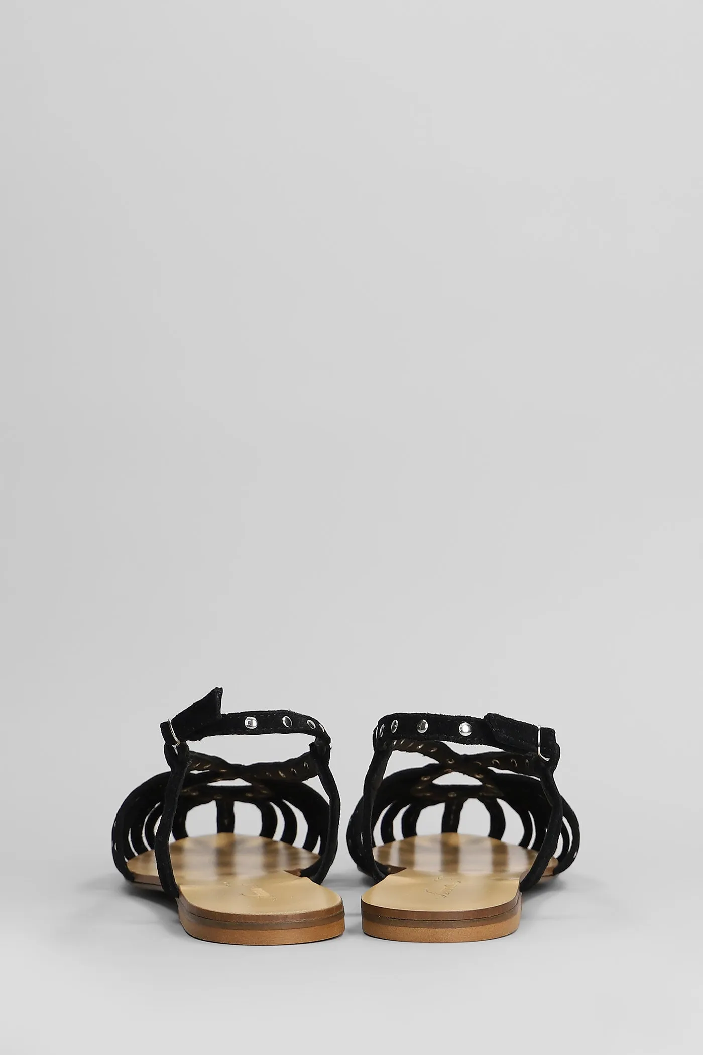 Flats in black suede