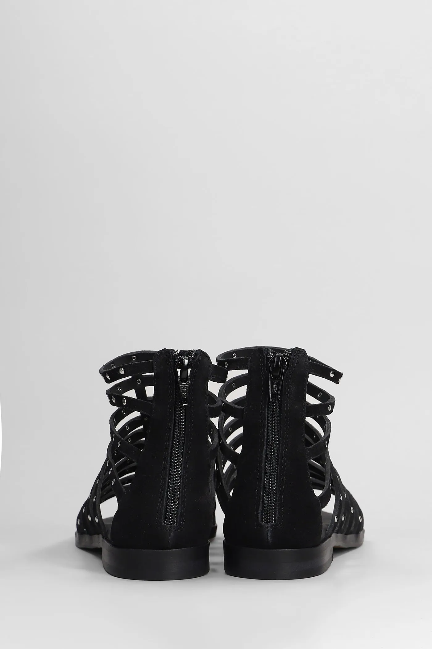 Flats in black suede