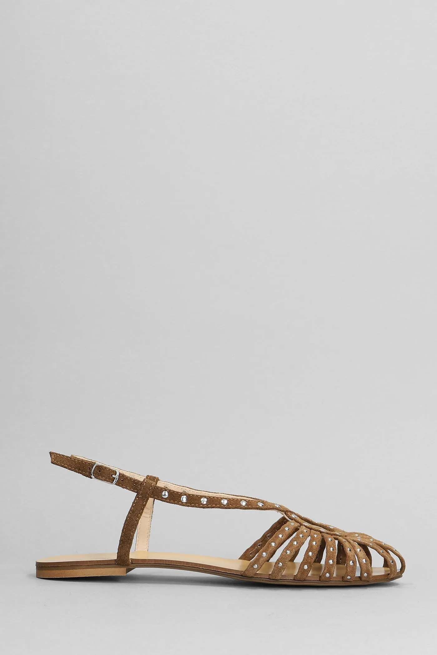 Flats in brown suede