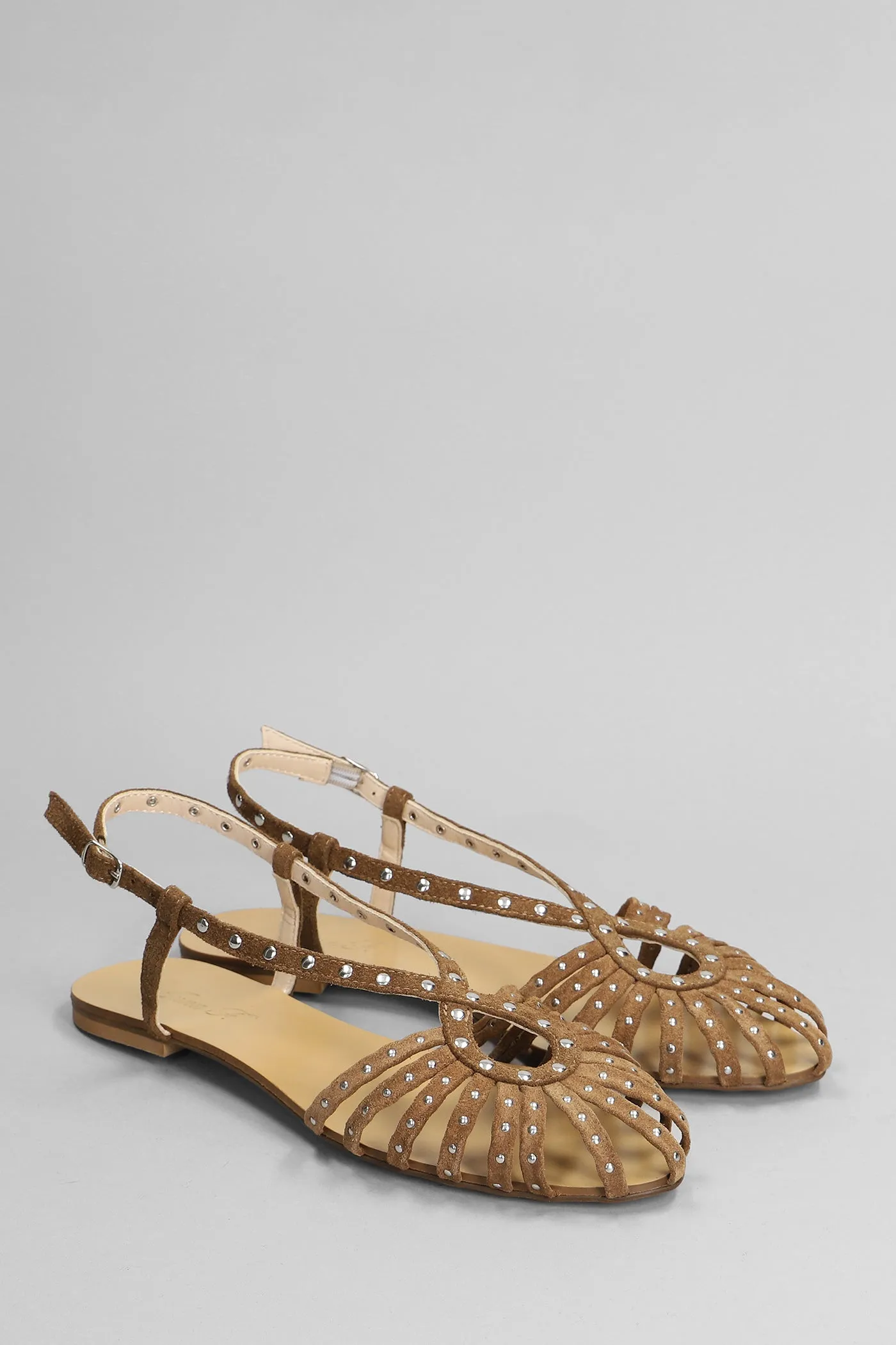 Flats in brown suede