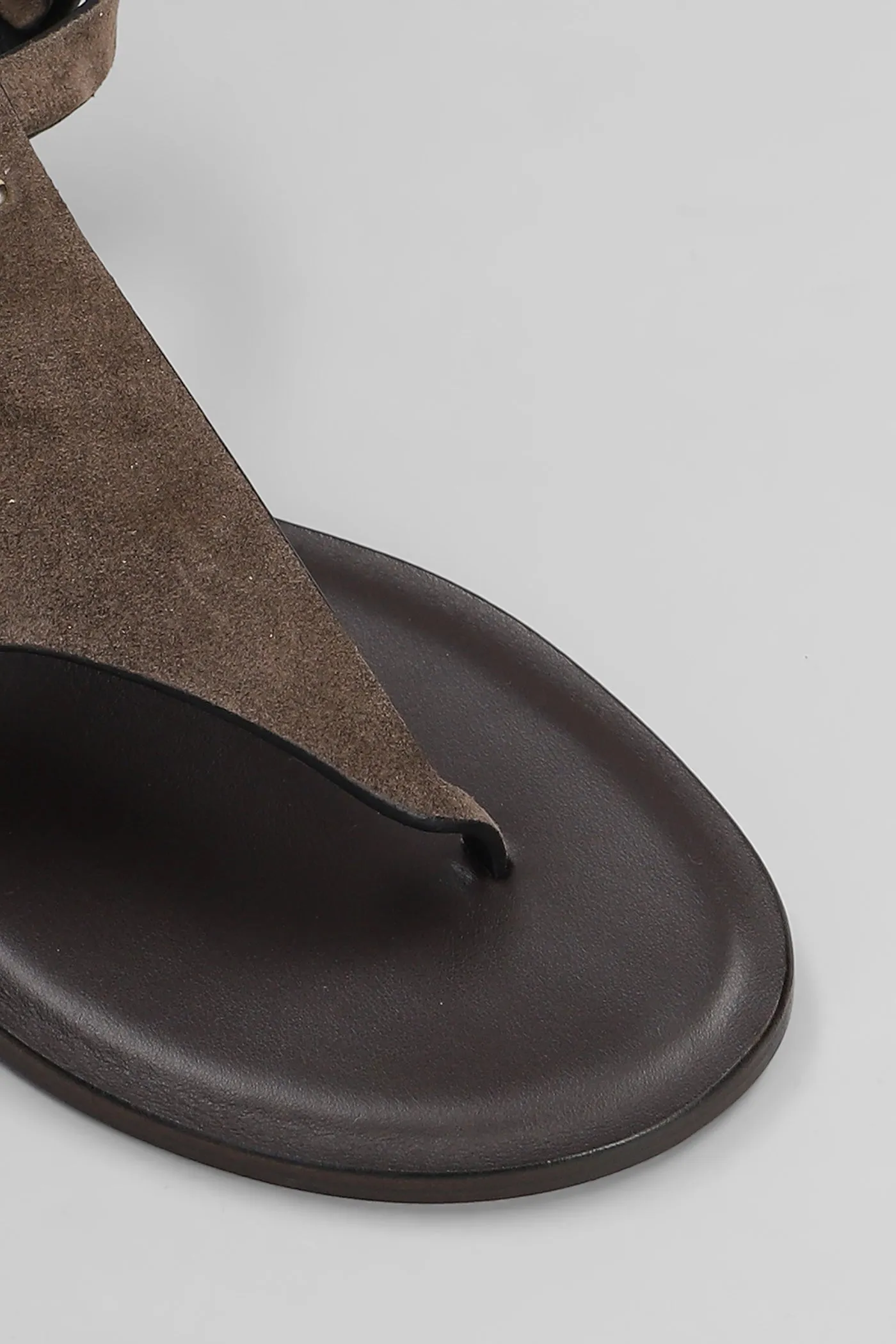 Flats in brown suede