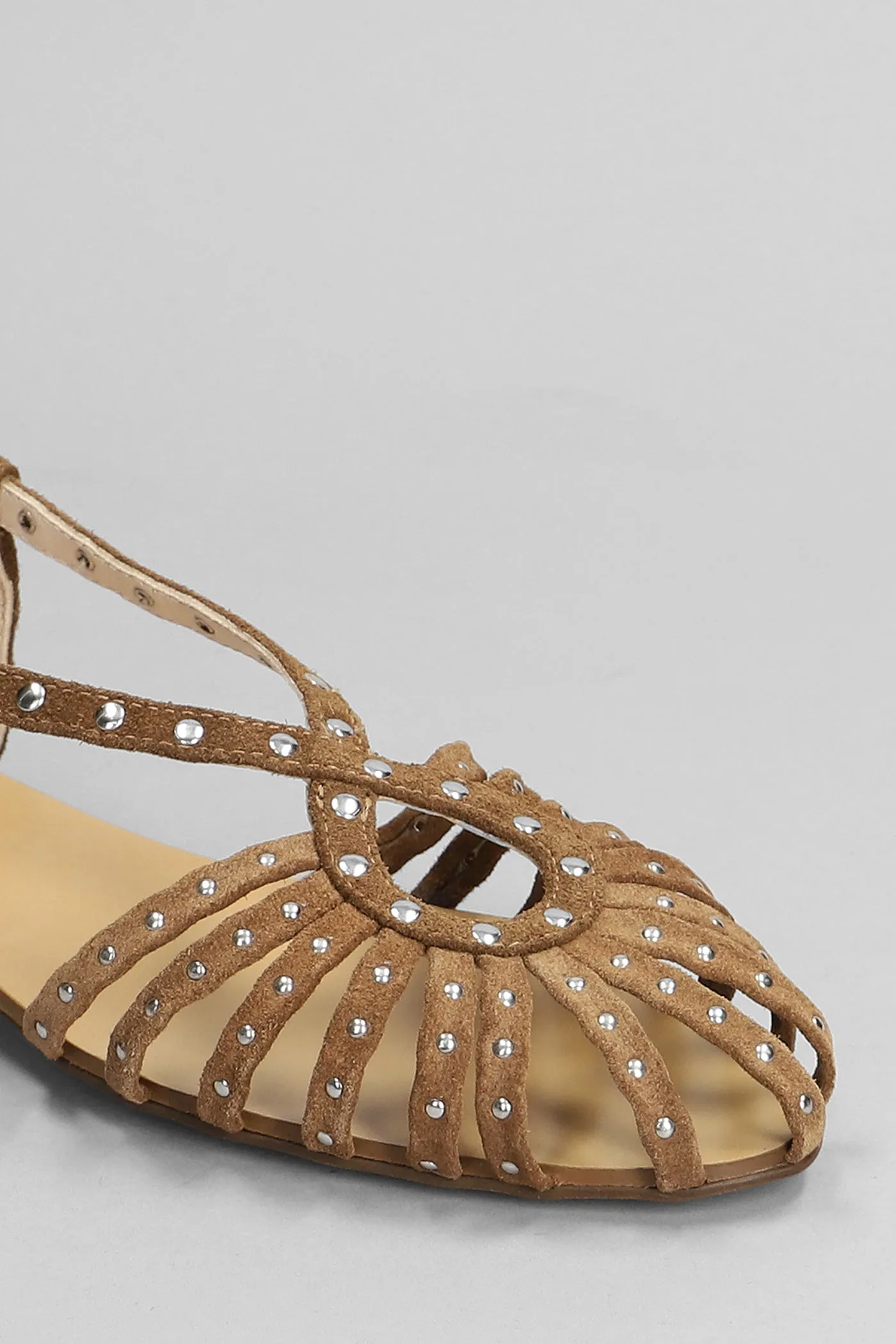 Flats in brown suede