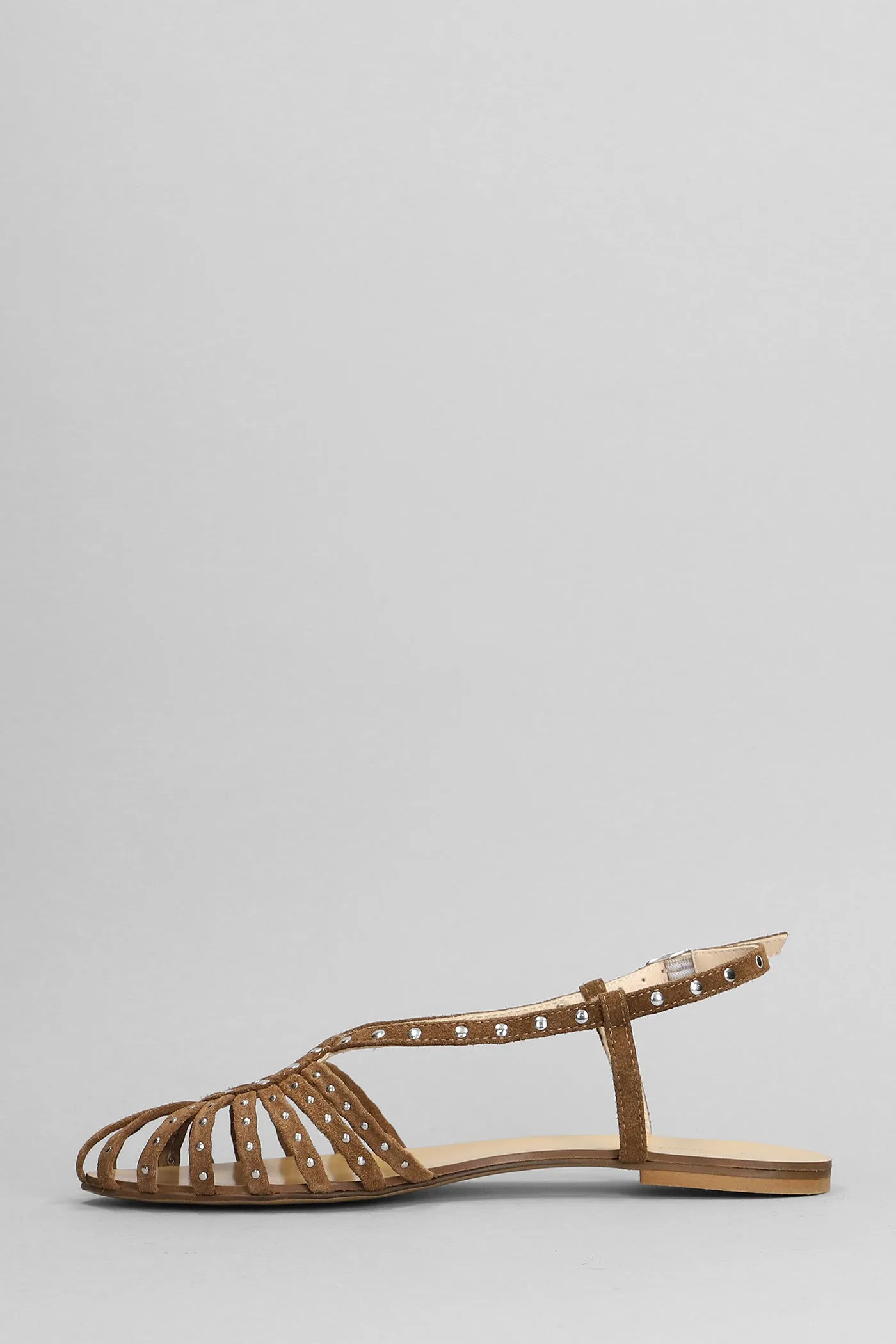 Flats in brown suede