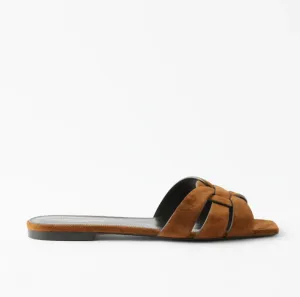 SAINT LAURENT
Tribute braided-strap suede sandals